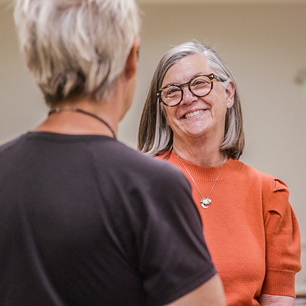 Older woman cooking at home